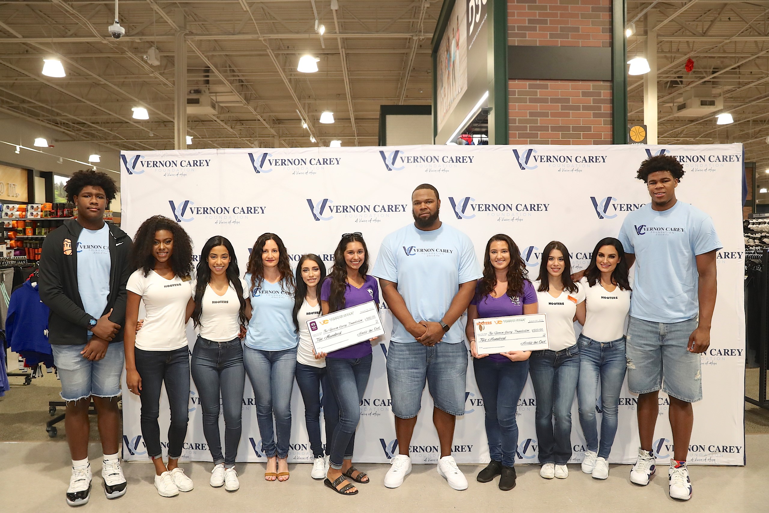 Vernon Carey Foundation checks