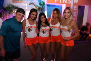 4 hooters girls and happy man